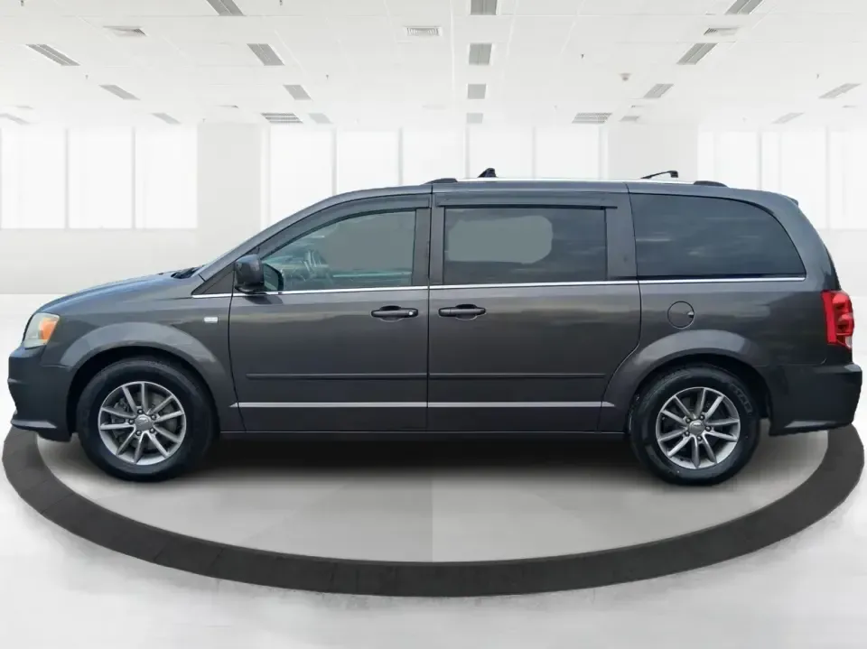 2014 Dodge Grand Caravan SXT 30th Anniversary (2C4RDGCGXER) with an 3.6L V-6 DOHC engine, 6-Speed Automatic transmission, located at 1951 S Dayton Lakeview Rd., New Carlisle, OH, 45344, (937) 908-9800, 39.890999, -84.050255 - Load up the kids, the coolers, and the weekend plans-this 2014 Dodge Grand Caravan SXT 30th Anniversary is built for real life in Ohio, whether you're handling school drop-offs, commuting down I70, or taking a road trip to the National Museum of the U.S. Air Force in nearby Dayton. With three rows a - Photo#5