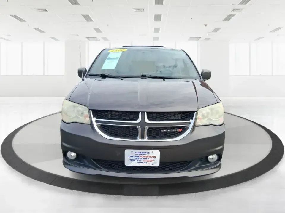 2014 Dodge Grand Caravan SXT 30th Anniversary (2C4RDGCGXER) with an 3.6L V-6 DOHC engine, 6-Speed Automatic transmission, located at 1951 S Dayton Lakeview Rd., New Carlisle, OH, 45344, (937) 908-9800, 39.890999, -84.050255 - Load up the kids, the coolers, and the weekend plans-this 2014 Dodge Grand Caravan SXT 30th Anniversary is built for real life in Ohio, whether you're handling school drop-offs, commuting down I70, or taking a road trip to the National Museum of the U.S. Air Force in nearby Dayton. With three rows a - Photo#7