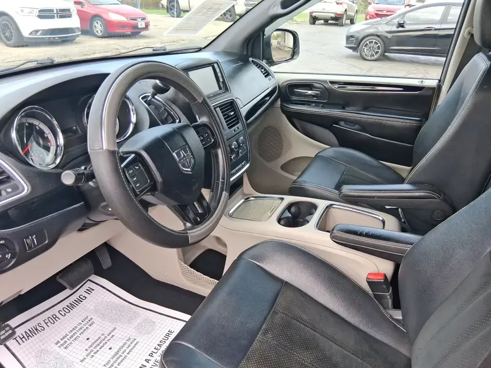 2014 Dodge Grand Caravan SXT 30th Anniversary (2C4RDGCGXER) with an 3.6L V-6 DOHC engine, 6-Speed Automatic transmission, located at 1951 S Dayton Lakeview Rd., New Carlisle, OH, 45344, (937) 908-9800, 39.890999, -84.050255 - Load up the kids, the coolers, and the weekend plans-this 2014 Dodge Grand Caravan SXT 30th Anniversary is built for real life in Ohio, whether you're handling school drop-offs, commuting down I70, or taking a road trip to the National Museum of the U.S. Air Force in nearby Dayton. With three rows a - Photo#9