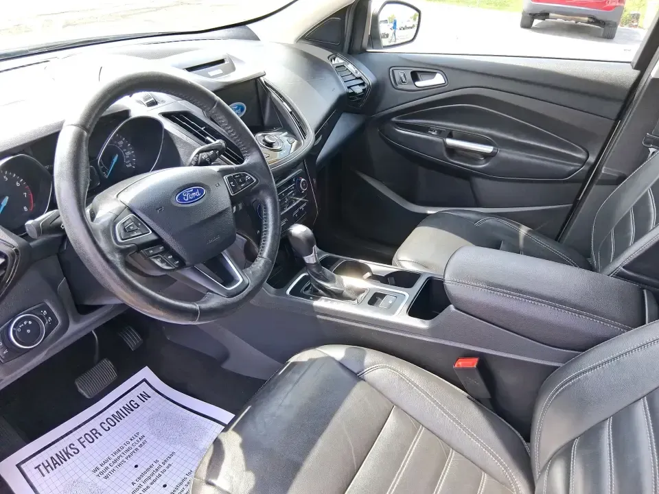 2017 Ford Escape Titanium (1FMCU9JD2HU) with an 1.5L L4 DOHC 16V engine, 6A transmission, located at 1230 East Main St, Xenia, OH, 45385, (937) 908-9800, 39.688026, -83.910172 - Whether you're a busy commuter running up and down US-35, a growing family juggling school drop-offs, or a weekend explorer heading out toward John Bryan State Park, this 2017 Ford Escape Titanium is the kind of compact SUV that fits real life in Xenia. With confident AWD capability, upscale comfort - Photo#9