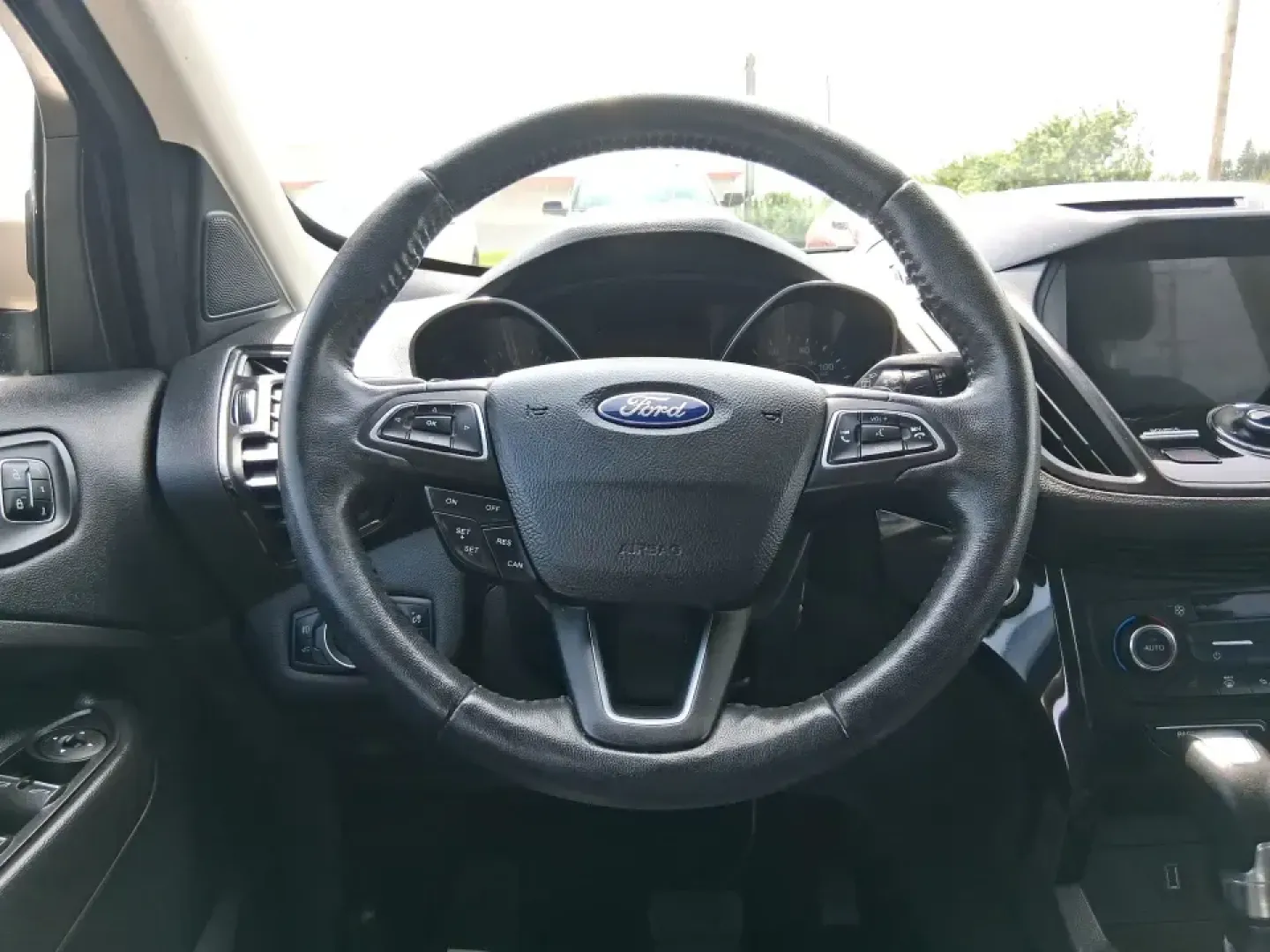 2017 Ford Escape Titanium (1FMCU9JD2HU) with an 1.5L L4 DOHC 16V engine, 6A transmission, located at 1230 East Main St, Xenia, OH, 45385, (937) 908-9800, 39.688026, -83.910172 - Whether you're a busy commuter running up and down US-35, a growing family juggling school drop-offs, or a weekend explorer heading out toward John Bryan State Park, this 2017 Ford Escape Titanium is the kind of compact SUV that fits real life in Xenia. With confident AWD capability, upscale comfort - Photo#16