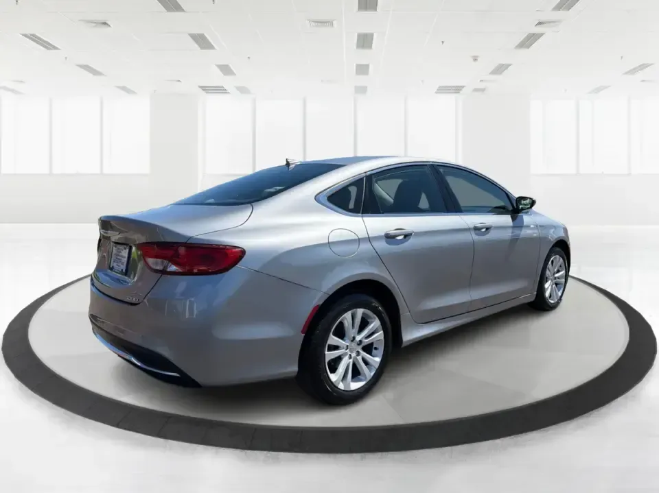 2016 Chrysler 200 Limited Platinum (1C3CCCABXGN) with an 2.4L L4 DOHC 16V engine, 9A transmission, located at 1184 Kauffman Ave, Fairborn, OH, 45324, (937) 908-9800, 39.807072, -84.030914 - Picture your next weekday commute down I675 or a smooth evening drive past Wright State University-quiet cabin, premium touches, and the kind of comfort that makes errands, school drop-offs, and date nights feel effortless. This 2016 Chrysler 200 Limited Platinum in Billet Silver Metallic Clearcoat - Photo#2