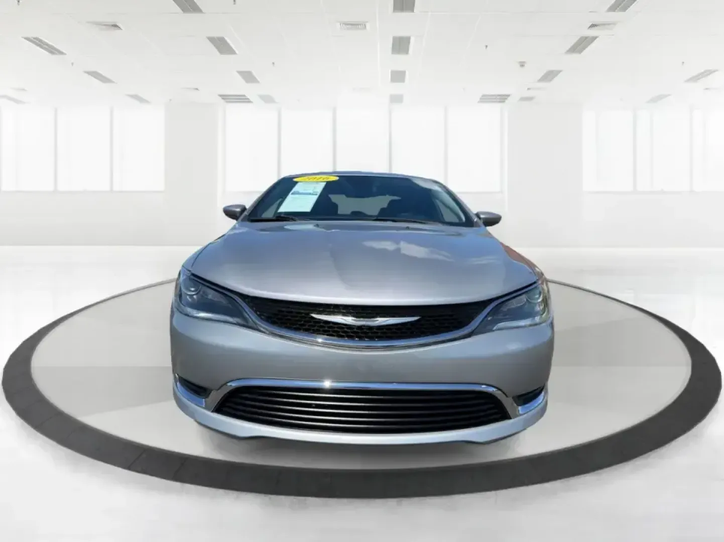 2016 Chrysler 200 Limited Platinum (1C3CCCABXGN) with an 2.4L L4 DOHC 16V engine, 9A transmission, located at 8750 N County Rd 25A, Piqua, OH, 45356, (937) 908-9800, 40.164391, -84.232513 - Picture your next weekday commute down I675 or a smooth evening drive past Wright State University-quiet cabin, premium touches, and the kind of comfort that makes errands, school drop-offs, and date nights feel effortless. This 2016 Chrysler 200 Limited Platinum in Billet Silver Metallic Clearcoat - Photo#7