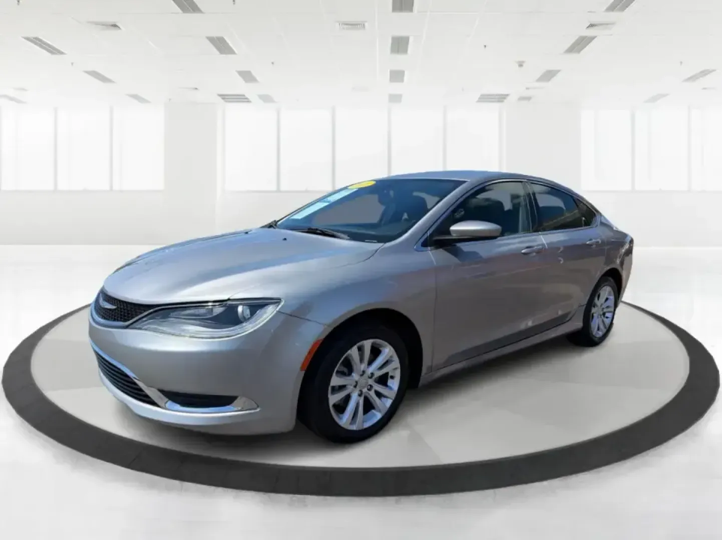 2016 Chrysler 200 Limited Platinum (1C3CCCABXGN) with an 2.4L L4 DOHC 16V engine, 9A transmission, located at 8750 N County Rd 25A, Piqua, OH, 45356, (937) 908-9800, 40.164391, -84.232513 - Picture your next weekday commute down I675 or a smooth evening drive past Wright State University-quiet cabin, premium touches, and the kind of comfort that makes errands, school drop-offs, and date nights feel effortless. This 2016 Chrysler 200 Limited Platinum in Billet Silver Metallic Clearcoat - Photo#8