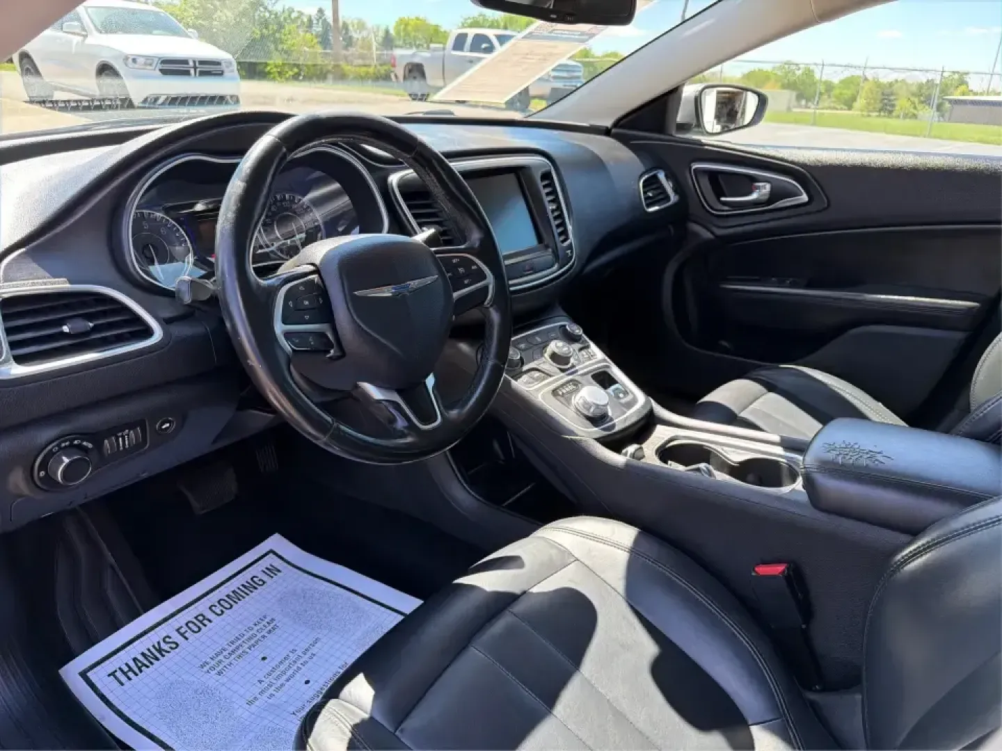 2016 Chrysler 200 Limited Platinum (1C3CCCABXGN) with an 2.4L L4 DOHC 16V engine, 9A transmission, located at 8750 N County Rd 25A, Piqua, OH, 45356, (937) 908-9800, 40.164391, -84.232513 - Picture your next weekday commute down I675 or a smooth evening drive past Wright State University-quiet cabin, premium touches, and the kind of comfort that makes errands, school drop-offs, and date nights feel effortless. This 2016 Chrysler 200 Limited Platinum in Billet Silver Metallic Clearcoat - Photo#9