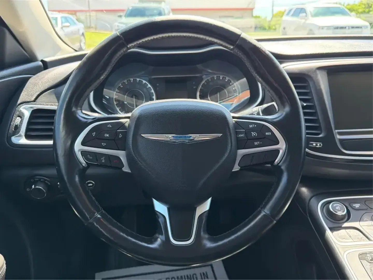 2016 Chrysler 200 Limited Platinum (1C3CCCABXGN) with an 2.4L L4 DOHC 16V engine, 9A transmission, located at 8750 N County Rd 25A, Piqua, OH, 45356, (937) 908-9800, 40.164391, -84.232513 - Picture your next weekday commute down I675 or a smooth evening drive past Wright State University-quiet cabin, premium touches, and the kind of comfort that makes errands, school drop-offs, and date nights feel effortless. This 2016 Chrysler 200 Limited Platinum in Billet Silver Metallic Clearcoat - Photo#16