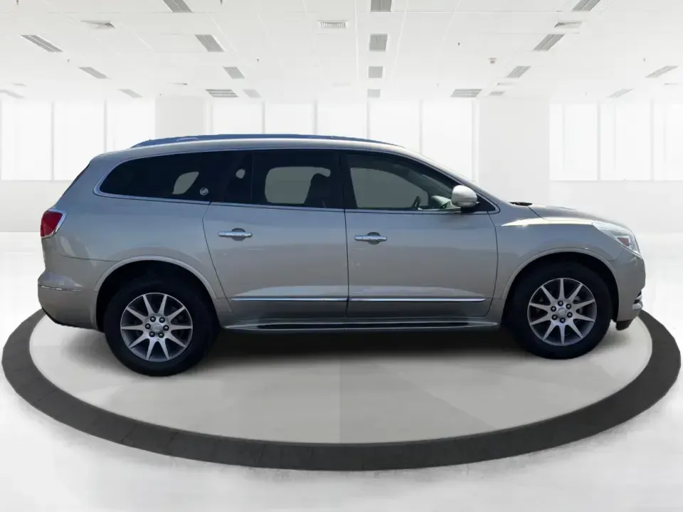 2016 Buick Enclave Leather (5GAKVBKD6GJ) with an 3.6L V-6 gasoline direct injection engine, 6-Speed Automatic Overdrive transmission, located at 8750 N County Rd 25A, Piqua, OH, 45356, (937) 908-9800, 40.164391, -84.232513 - Need one vehicle that can handle school drop-offs, grocery runs, and a weekend road trip down I-75 without feeling cramped? This 2016 Buick Enclave Leather in Iridium Metallic is built for real-life family logistics and comfortable commuting around Moraine, Dayton, and the Miami Valley-offering thre - Photo#1