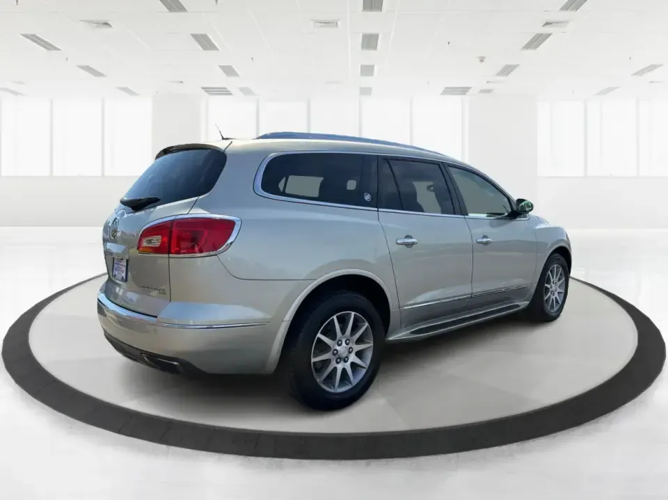 2016 Buick Enclave Leather (5GAKVBKD6GJ) with an 3.6L V-6 gasoline direct injection engine, 6-Speed Automatic Overdrive transmission, located at 8750 N County Rd 25A, Piqua, OH, 45356, (937) 908-9800, 40.164391, -84.232513 - Need one vehicle that can handle school drop-offs, grocery runs, and a weekend road trip down I-75 without feeling cramped? This 2016 Buick Enclave Leather in Iridium Metallic is built for real-life family logistics and comfortable commuting around Moraine, Dayton, and the Miami Valley-offering thre - Photo#2