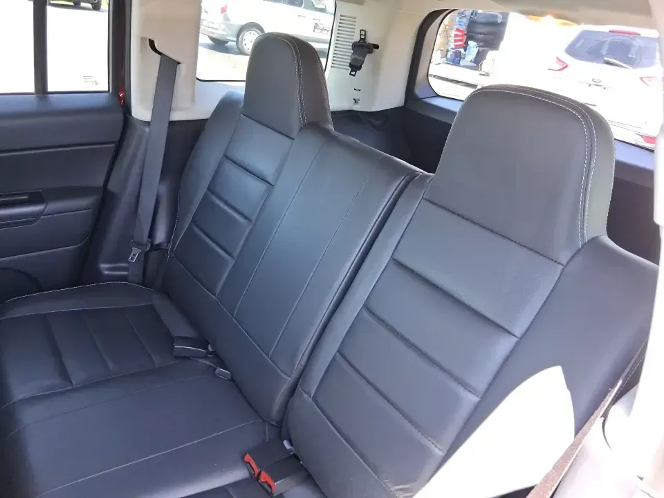 2015 Jeep Patriot High Altitude Edition (1C4NJRFB0FD) with an 2.4L I-4 DOHC engine, located at 1099 N County Rd 25A, Troy, OH, 45373, (937) 908-9800, 40.057079, -84.212883 - Picture your next Ohio weekend: loading up for a road trip to Hocking Hills, heading to a kids' tournament at Duke Park, or navigating winter backroads outside Troy with confidence. This **2015 Jeep Patriot High Altitude Edition** is the kind of SUV that fits real life-practical for daily errands, c - Photo#10