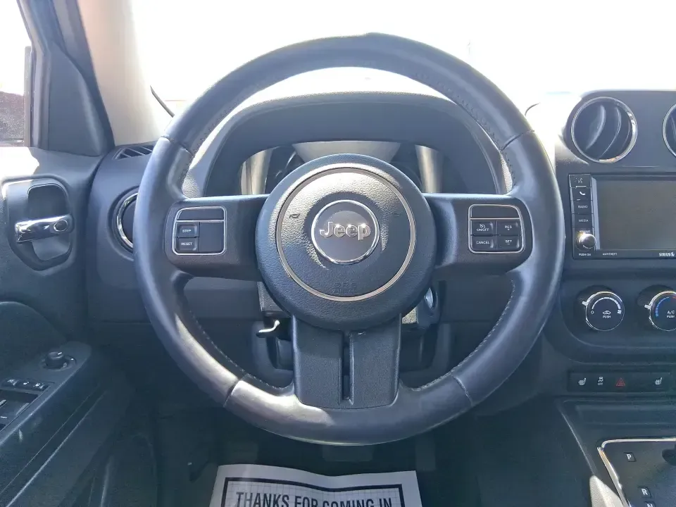 2015 Jeep Patriot High Altitude Edition (1C4NJRFB0FD) with an 2.4L I-4 DOHC engine, located at 1099 N County Rd 25A, Troy, OH, 45373, (937) 908-9800, 40.057079, -84.212883 - Picture your next Ohio weekend: loading up for a road trip to Hocking Hills, heading to a kids' tournament at Duke Park, or navigating winter backroads outside Troy with confidence. This **2015 Jeep Patriot High Altitude Edition** is the kind of SUV that fits real life-practical for daily errands, c - Photo#16