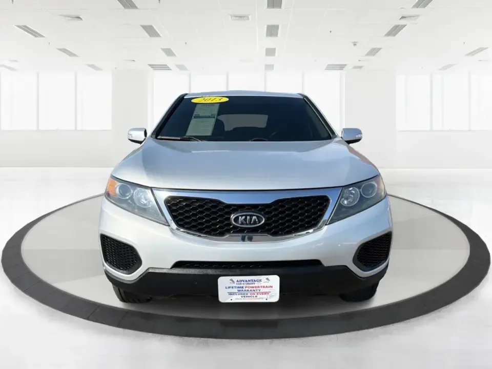 2013 Kia Sorento LX (5XYKT3A12DG) with an 2.4L I-4 DOHC engine, 6-Speed Automatic transmission, located at 8750 N County Rd 25A, Piqua, OH, 45356, (937) 908-9800, 40.164391, -84.232513 - Need one SUV that can handle the school run, a long commute up I75, and a weekend getaway to Indian Lake without blowing your budget? This 2013 Kia Sorento LX in Satin Metal is a practical, road-trip-ready SUV that's sized for real life-easy to park, comfortable for passengers, and versatile enough - Photo#7