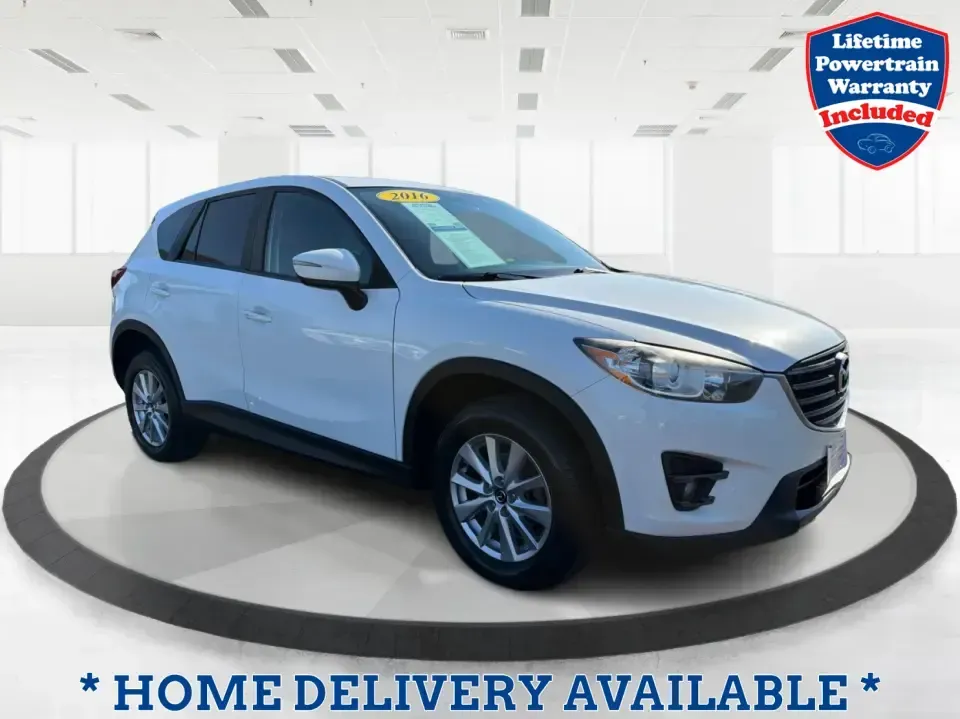 2016 Mazda CX-5 Touring (JM3KE4CYXG0) with an SKYACTIV-G 2.5L I-4 gasoline direct injection engine, 6-Speed Automatic transmission, located at 1230 East Main St, Xenia, OH, 45385, (937) 908-9800, 39.688026, -83.910172 - Pack up the kids, load the groceries, or point the nose toward a weekend road trip-this 2016 Mazda CX-5 Touring is the kind of SUV that fits real life in Piqua. With confident all-weather capability and a comfortable, well-equipped cabin, it's a smart choice for commuters running up and down I75, fa - Photo#0