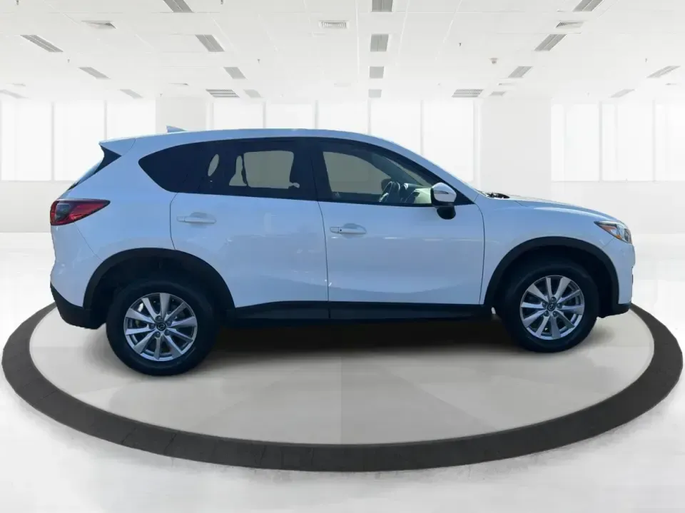 2016 Mazda CX-5 Touring (JM3KE4CYXG0) with an SKYACTIV-G 2.5L I-4 gasoline direct injection engine, 6-Speed Automatic transmission, located at 1230 East Main St, Xenia, OH, 45385, (937) 908-9800, 39.688026, -83.910172 - Pack up the kids, load the groceries, or point the nose toward a weekend road trip-this 2016 Mazda CX-5 Touring is the kind of SUV that fits real life in Piqua. With confident all-weather capability and a comfortable, well-equipped cabin, it's a smart choice for commuters running up and down I75, fa - Photo#1