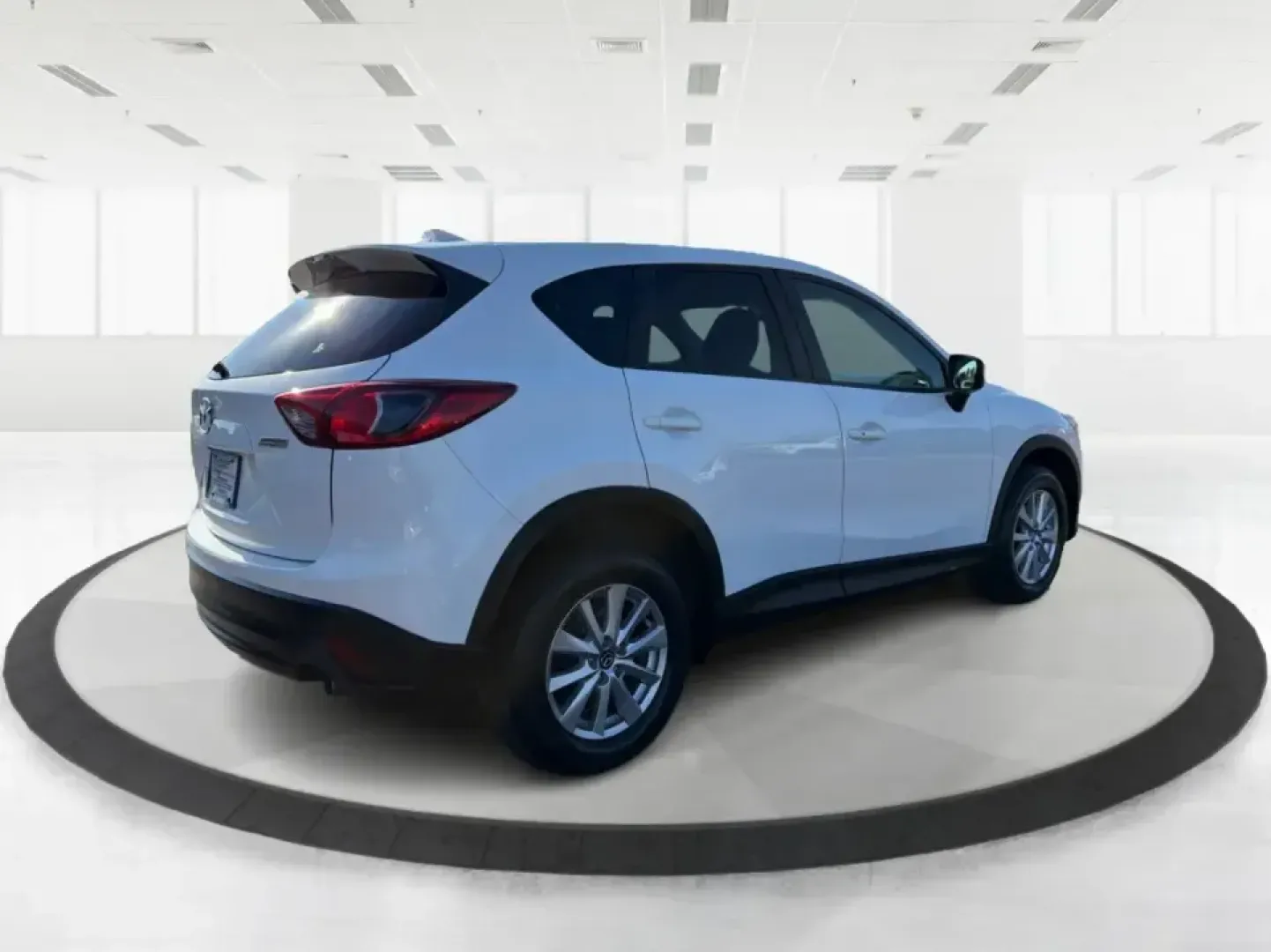 2016 Mazda CX-5 Touring (JM3KE4CYXG0) with an SKYACTIV-G 2.5L I-4 gasoline direct injection engine, 6-Speed Automatic transmission, located at 1099 N County Rd 25A, Troy, OH, 45373, (937) 908-9800, 40.057079, -84.212883 - Pack up the kids, load the groceries, or point the nose toward a weekend road trip-this 2016 Mazda CX-5 Touring is the kind of SUV that fits real life in Piqua. With confident all-weather capability and a comfortable, well-equipped cabin, it's a smart choice for commuters running up and down I75, fa - Photo#2