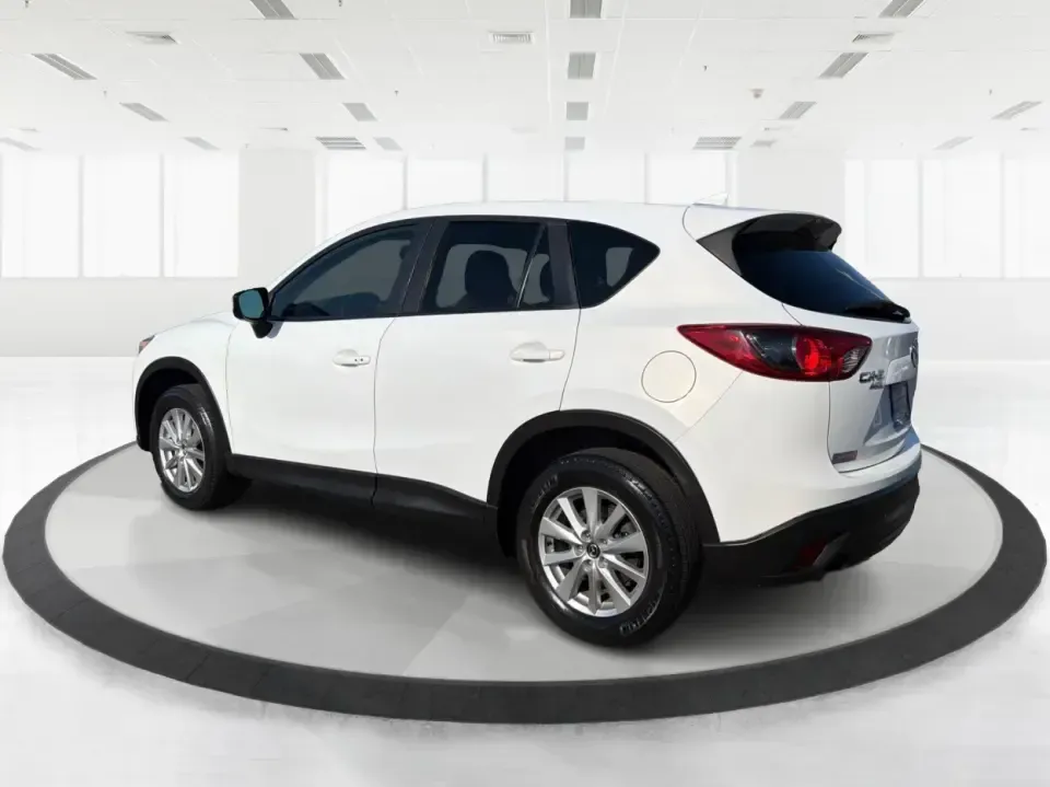 2016 Mazda CX-5 Touring (JM3KE4CYXG0) with an SKYACTIV-G 2.5L I-4 gasoline direct injection engine, 6-Speed Automatic transmission, located at 1230 East Main St, Xenia, OH, 45385, (937) 908-9800, 39.688026, -83.910172 - Pack up the kids, load the groceries, or point the nose toward a weekend road trip-this 2016 Mazda CX-5 Touring is the kind of SUV that fits real life in Piqua. With confident all-weather capability and a comfortable, well-equipped cabin, it's a smart choice for commuters running up and down I75, fa - Photo#4