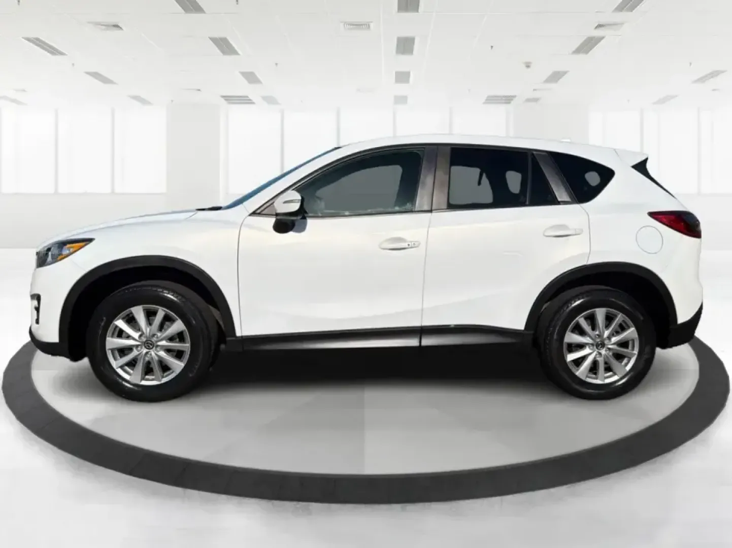2016 Mazda CX-5 Touring (JM3KE4CYXG0) with an SKYACTIV-G 2.5L I-4 gasoline direct injection engine, 6-Speed Automatic transmission, located at 1099 N County Rd 25A, Troy, OH, 45373, (937) 908-9800, 40.057079, -84.212883 - Pack up the kids, load the groceries, or point the nose toward a weekend road trip-this 2016 Mazda CX-5 Touring is the kind of SUV that fits real life in Piqua. With confident all-weather capability and a comfortable, well-equipped cabin, it's a smart choice for commuters running up and down I75, fa - Photo#5
