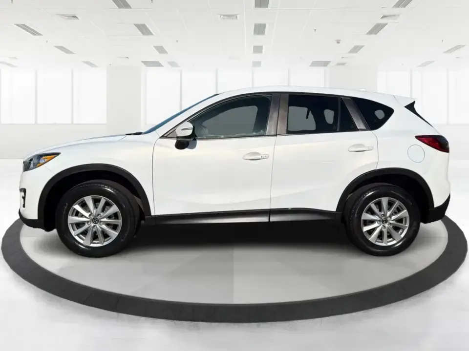 2016 Mazda CX-5 Touring (JM3KE4CYXG0) with an SKYACTIV-G 2.5L I-4 gasoline direct injection engine, 6-Speed Automatic transmission, located at 1230 East Main St, Xenia, OH, 45385, (937) 908-9800, 39.688026, -83.910172 - Pack up the kids, load the groceries, or point the nose toward a weekend road trip-this 2016 Mazda CX-5 Touring is the kind of SUV that fits real life in Piqua. With confident all-weather capability and a comfortable, well-equipped cabin, it's a smart choice for commuters running up and down I75, fa - Photo#5