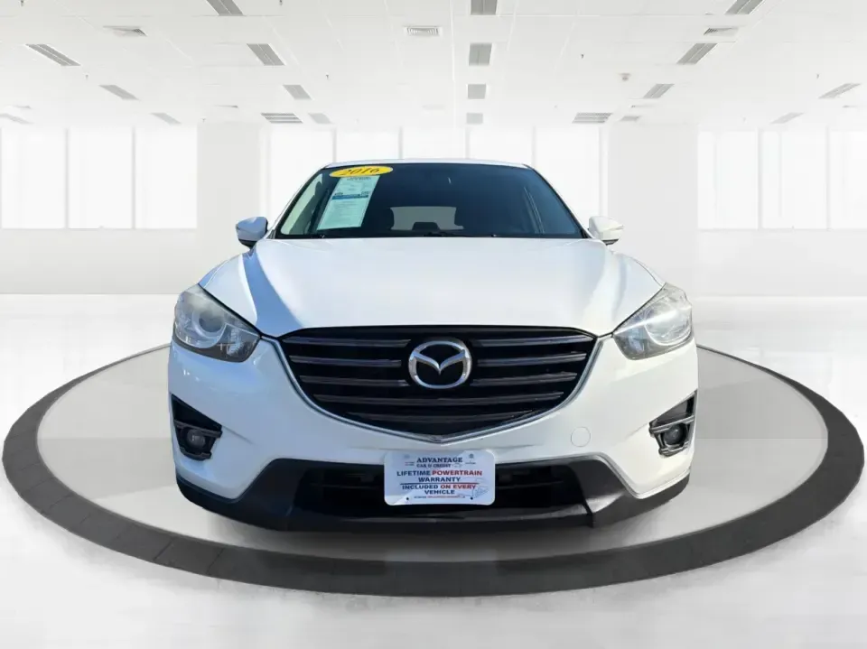 2016 Mazda CX-5 Touring (JM3KE4CYXG0) with an SKYACTIV-G 2.5L I-4 gasoline direct injection engine, 6-Speed Automatic transmission, located at 1230 East Main St, Xenia, OH, 45385, (937) 908-9800, 39.688026, -83.910172 - Pack up the kids, load the groceries, or point the nose toward a weekend road trip-this 2016 Mazda CX-5 Touring is the kind of SUV that fits real life in Piqua. With confident all-weather capability and a comfortable, well-equipped cabin, it's a smart choice for commuters running up and down I75, fa - Photo#7