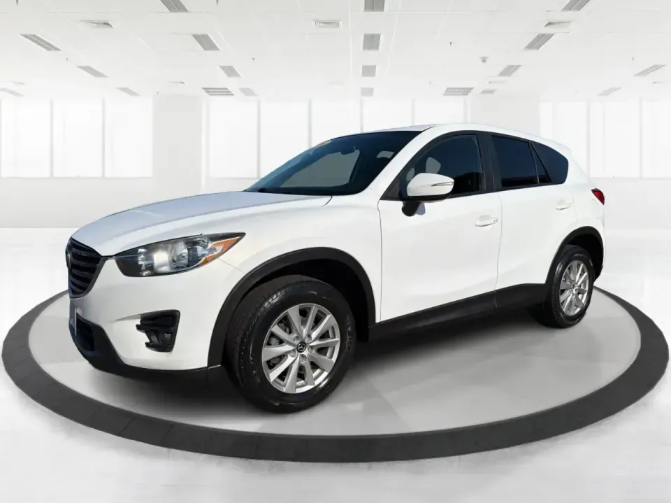 2016 Mazda CX-5 Touring (JM3KE4CYXG0) with an SKYACTIV-G 2.5L I-4 gasoline direct injection engine, 6-Speed Automatic transmission, located at 1230 East Main St, Xenia, OH, 45385, (937) 908-9800, 39.688026, -83.910172 - Pack up the kids, load the groceries, or point the nose toward a weekend road trip-this 2016 Mazda CX-5 Touring is the kind of SUV that fits real life in Piqua. With confident all-weather capability and a comfortable, well-equipped cabin, it's a smart choice for commuters running up and down I75, fa - Photo#8