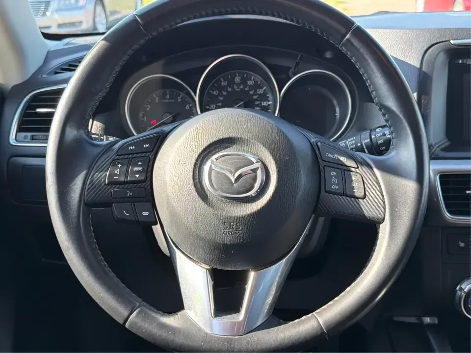 2016 Mazda CX-5 Touring (JM3KE4CYXG0) with an SKYACTIV-G 2.5L I-4 gasoline direct injection engine, 6-Speed Automatic transmission, located at 1230 East Main St, Xenia, OH, 45385, (937) 908-9800, 39.688026, -83.910172 - Pack up the kids, load the groceries, or point the nose toward a weekend road trip-this 2016 Mazda CX-5 Touring is the kind of SUV that fits real life in Piqua. With confident all-weather capability and a comfortable, well-equipped cabin, it's a smart choice for commuters running up and down I75, fa - Photo#16