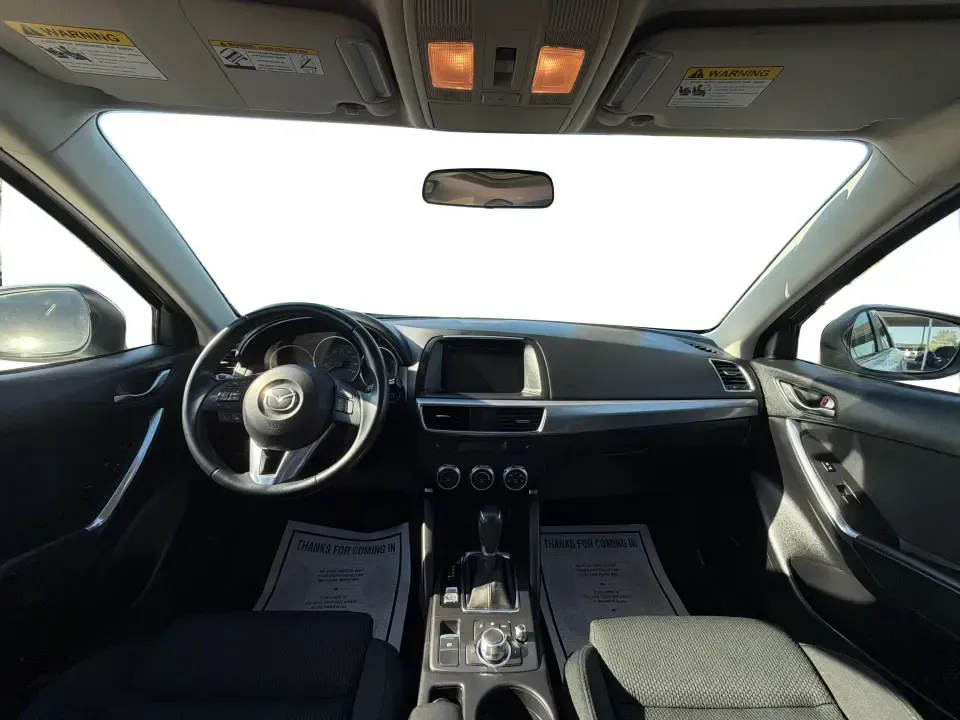 2016 Mazda CX-5 Touring (JM3KE4CYXG0) with an SKYACTIV-G 2.5L I-4 gasoline direct injection engine, 6-Speed Automatic transmission, located at 1230 East Main St, Xenia, OH, 45385, (937) 908-9800, 39.688026, -83.910172 - Pack up the kids, load the groceries, or point the nose toward a weekend road trip-this 2016 Mazda CX-5 Touring is the kind of SUV that fits real life in Piqua. With confident all-weather capability and a comfortable, well-equipped cabin, it's a smart choice for commuters running up and down I75, fa - Photo#20