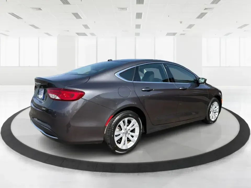 2015 Chrysler 200 Limited (1C3CCCAB6FN) with an 2.4L L4 DOHC 16V engine, 9-Speed Automatic transmission, located at 1099 N County Rd 25A, Troy, OH, 45373, (937) 908-9800, 40.057079, -84.212883 - Picture your next week: an easy I-75 commute, a comfortable run to Meijer, and a weekend cruise past the Miami County Fairgrounds-without stressing about how you'll get approved. This 2015 Chrysler 200 Limited is built for real life in Troy, Ohio: smooth, quiet, and efficient enough for daily drivin - Photo#2