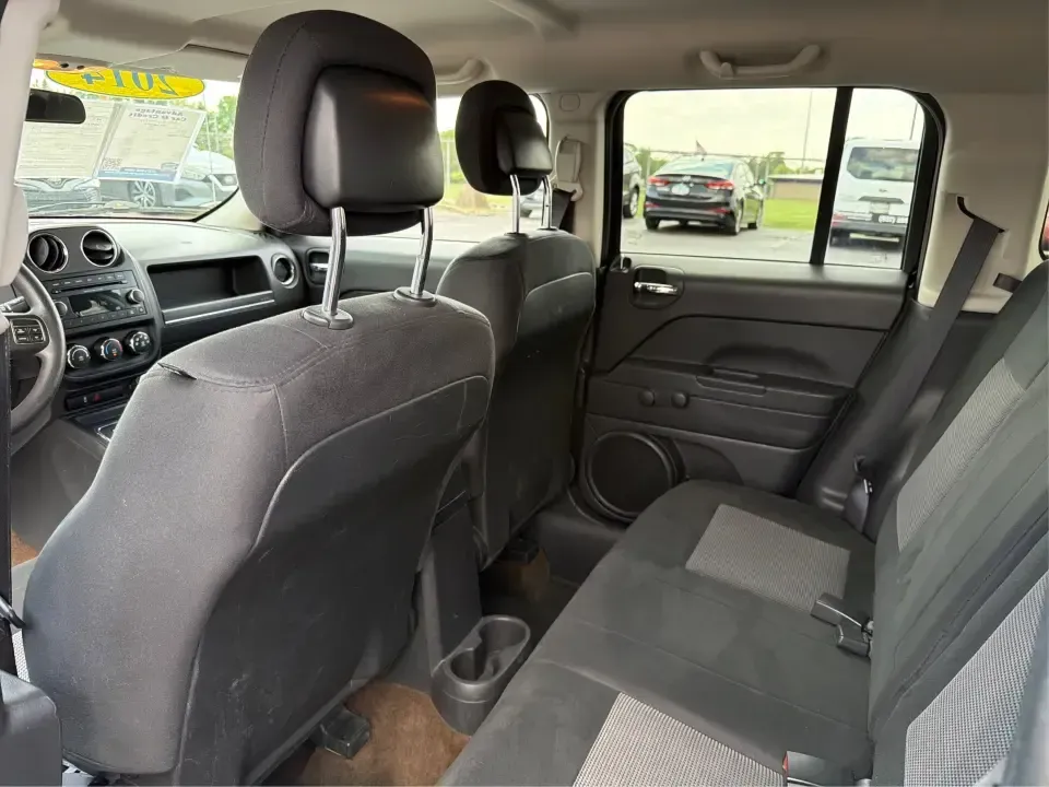 2014 Jeep Patriot Sport (1C4NJPBB0ED) with an 2.4L L4 DOHC 16V engine, located at 880 E. National Road, Vandalia, OH, 45377, (937) 908-9800, 39.891918, -84.183594 - Weekend getaways to the MetroParks, daily commutes down I75, or school-dropoff runs around Vandalia-this 2014 Jeep Patriot Sport is built for the kind of real-life driving that mixes practicality with a little adventure. Finished in Black Clearcoat with a versatile SUV body style, it's an easy fit f - Photo#10