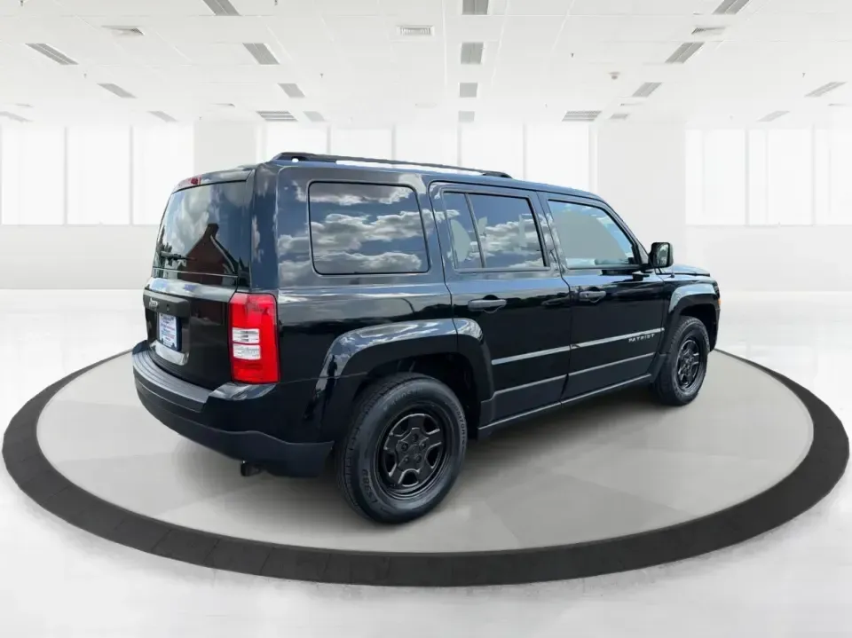 2014 Jeep Patriot Sport 2WD (1C4NJPBB0ED) with an 2.4L L4 DOHC 16V engine, located at 1099 N County Rd 25A, Troy, OH, 45373, (937) 908-9800, 40.057079, -84.212883 - Need a practical SUV for everyday life in Troy-school drop-offs, commutes down I75, and weekend runs to Charleston Falls Preserve or the Miami County Fairgrounds? This 2014 Jeep Patriot Sport 2WD is a smart pick for drivers who want SUV versatility, easy parking, and confidence-building safety featu- Photo#2