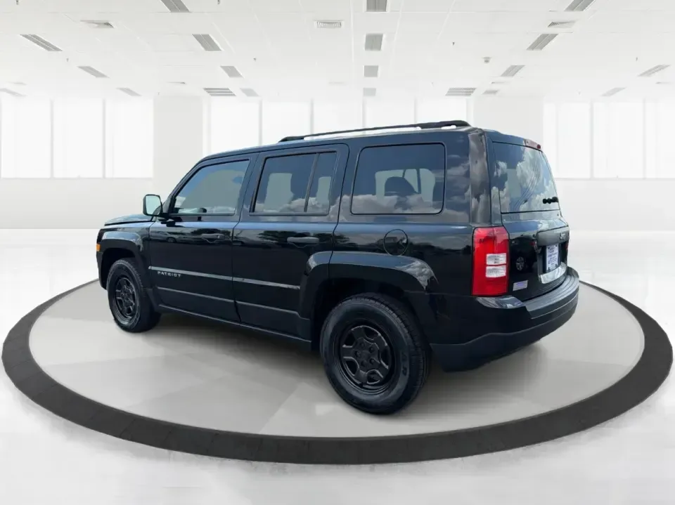 2014 Jeep Patriot Sport 2WD (1C4NJPBB0ED) with an 2.4L L4 DOHC 16V engine, located at 1099 N County Rd 25A, Troy, OH, 45373, (937) 908-9800, 40.057079, -84.212883 - Need a practical SUV for everyday life in Troy-school drop-offs, commutes down I75, and weekend runs to Charleston Falls Preserve or the Miami County Fairgrounds? This 2014 Jeep Patriot Sport 2WD is a smart pick for drivers who want SUV versatility, easy parking, and confidence-building safety featu- Photo#4
