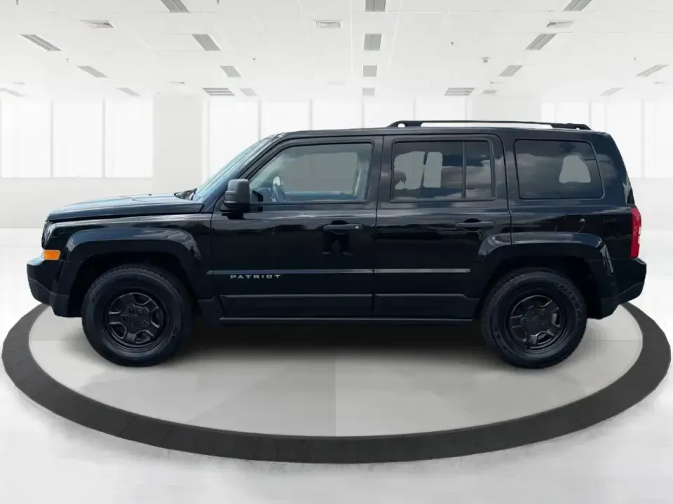 2014 Jeep Patriot Sport 2WD (1C4NJPBB0ED) with an 2.4L L4 DOHC 16V engine, located at 1099 N County Rd 25A, Troy, OH, 45373, (937) 908-9800, 40.057079, -84.212883 - Need a practical SUV for everyday life in Troy-school drop-offs, commutes down I75, and weekend runs to Charleston Falls Preserve or the Miami County Fairgrounds? This 2014 Jeep Patriot Sport 2WD is a smart pick for drivers who want SUV versatility, easy parking, and confidence-building safety featu- Photo#5