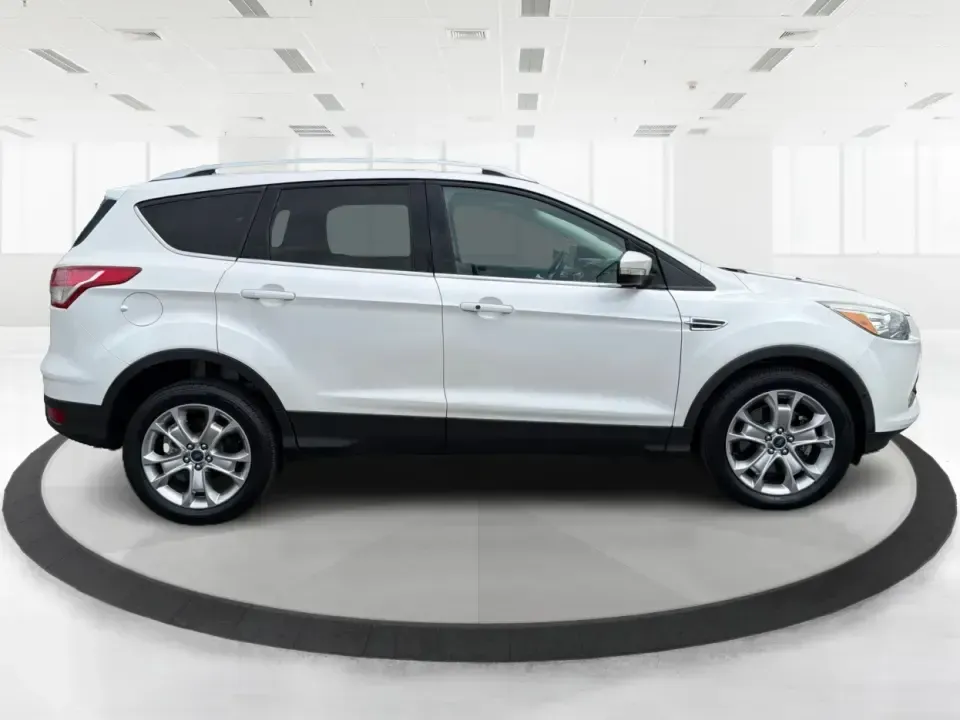 2014 Ford Escape Titanium (1FMCU9J92EU) with an 2.0L L4 DOHC 16V engine, 6-Speed Automatic transmission, located at 1951 S Dayton Lakeview Rd., New Carlisle, OH, 45344, (937) 908-9800, 39.890999, -84.050255 - Weekend escapes, daily commutes down I70, or family errands between New Carlisle and Huber Heights feel a whole lot easier when your SUV is comfortable, capable, and packed with the features you actually use. This 2014 Ford Escape Titanium 4WD is built for real life in Ohio-whether you're heading to - Photo#1