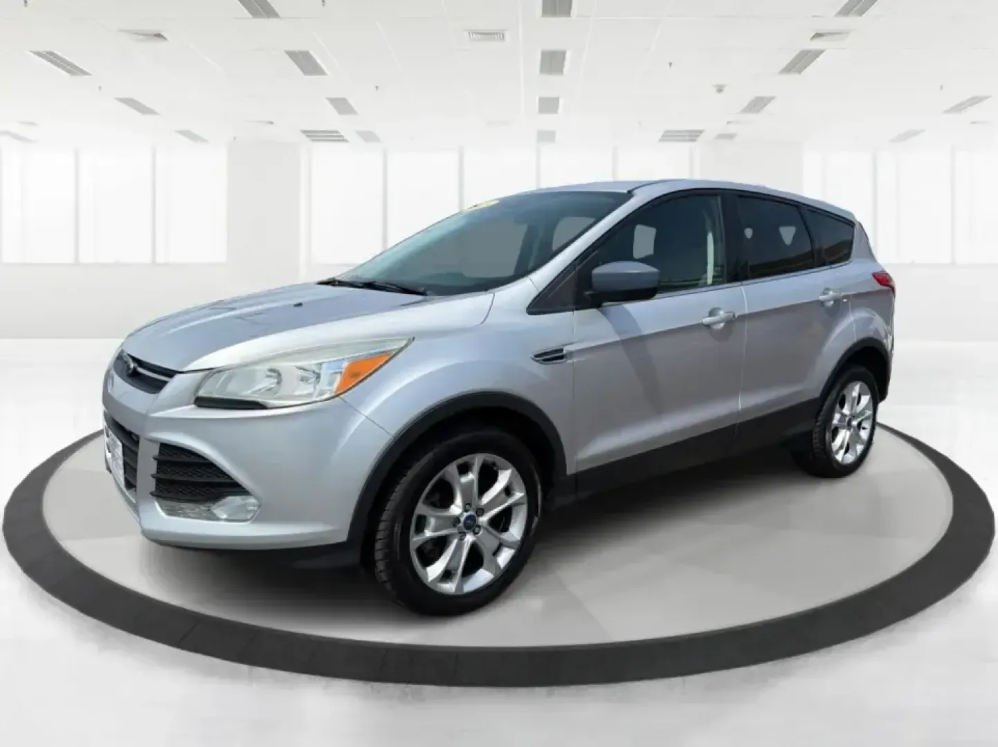 2015 Ford Escape SE (1FMCU9G98FU) with an 2.0L L4 DOHC 16V engine, 6-Speed Automatic transmission, located at 1099 N County Rd 25A, Troy, OH, 45373, (937) 908-9800, 40.057079, -84.212883 - Weekday commutes down I75, school drop-offs around Troy City Schools, and spontaneous weekend trips to Charleston Falls Preserve all get easier when you have an SUV that's the right size, the right power, and the right fit for your budget. This 2015 Ford Escape SE in Ingot Silver is built for real-l - Photo#8