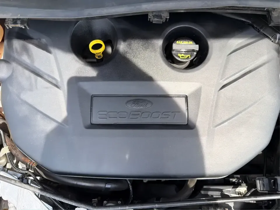 2015 Ford Escape SE (1FMCU9G98FU) with an 2.0L L4 DOHC 16V engine, 6-Speed Automatic transmission, located at 1099 N County Rd 25A, Troy, OH, 45373, (937) 908-9800, 40.057079, -84.212883 - Weekday commutes down I75, school drop-offs around Troy City Schools, and spontaneous weekend trips to Charleston Falls Preserve all get easier when you have an SUV that's the right size, the right power, and the right fit for your budget. This 2015 Ford Escape SE in Ingot Silver is built for real-l - Photo#11