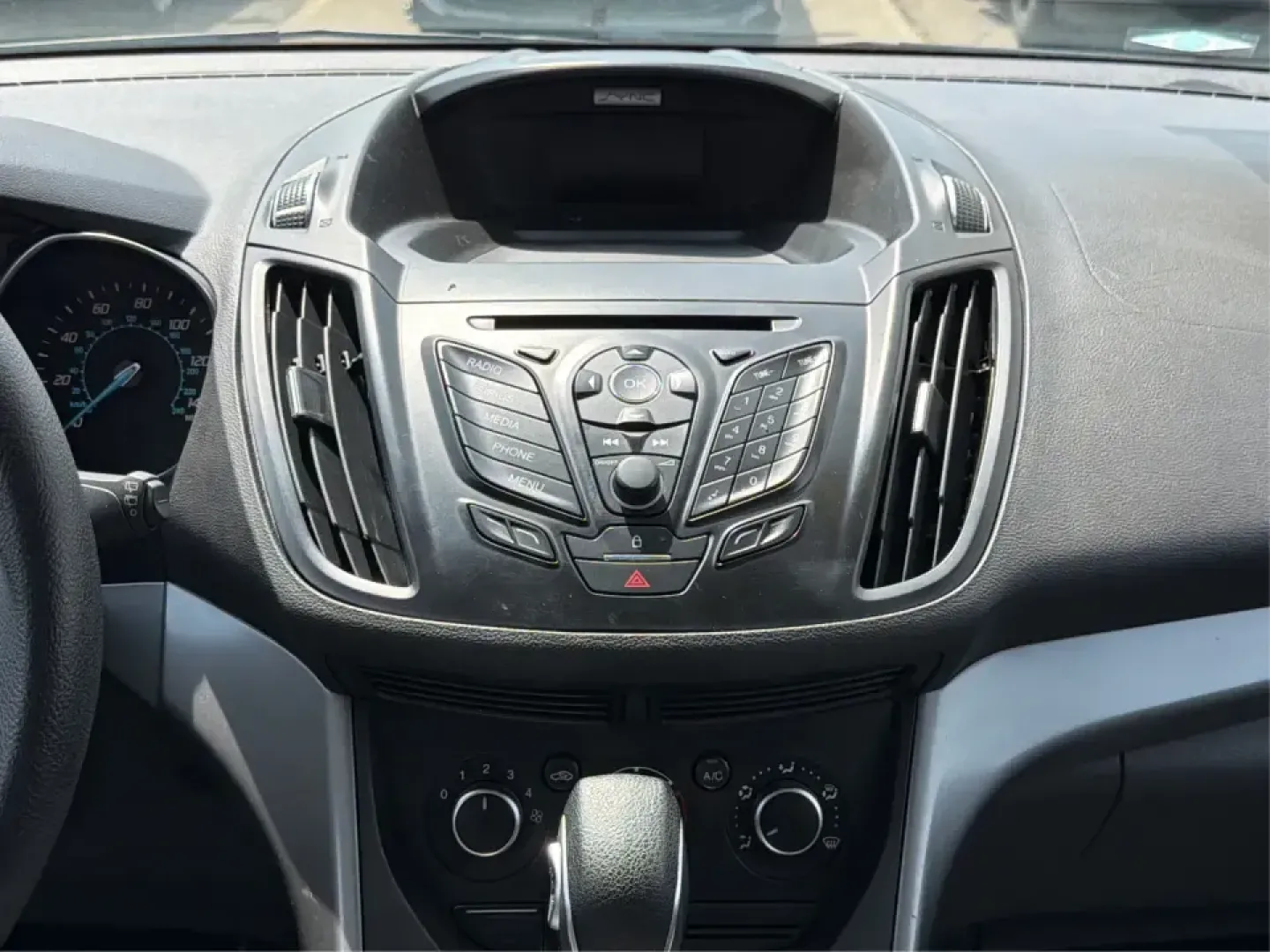 2015 Ford Escape SE (1FMCU9G98FU) with an 2.0L L4 DOHC 16V engine, 6-Speed Automatic transmission, located at 1099 N County Rd 25A, Troy, OH, 45373, (937) 908-9800, 40.057079, -84.212883 - Weekday commutes down I75, school drop-offs around Troy City Schools, and spontaneous weekend trips to Charleston Falls Preserve all get easier when you have an SUV that's the right size, the right power, and the right fit for your budget. This 2015 Ford Escape SE in Ingot Silver is built for real-l - Photo#13