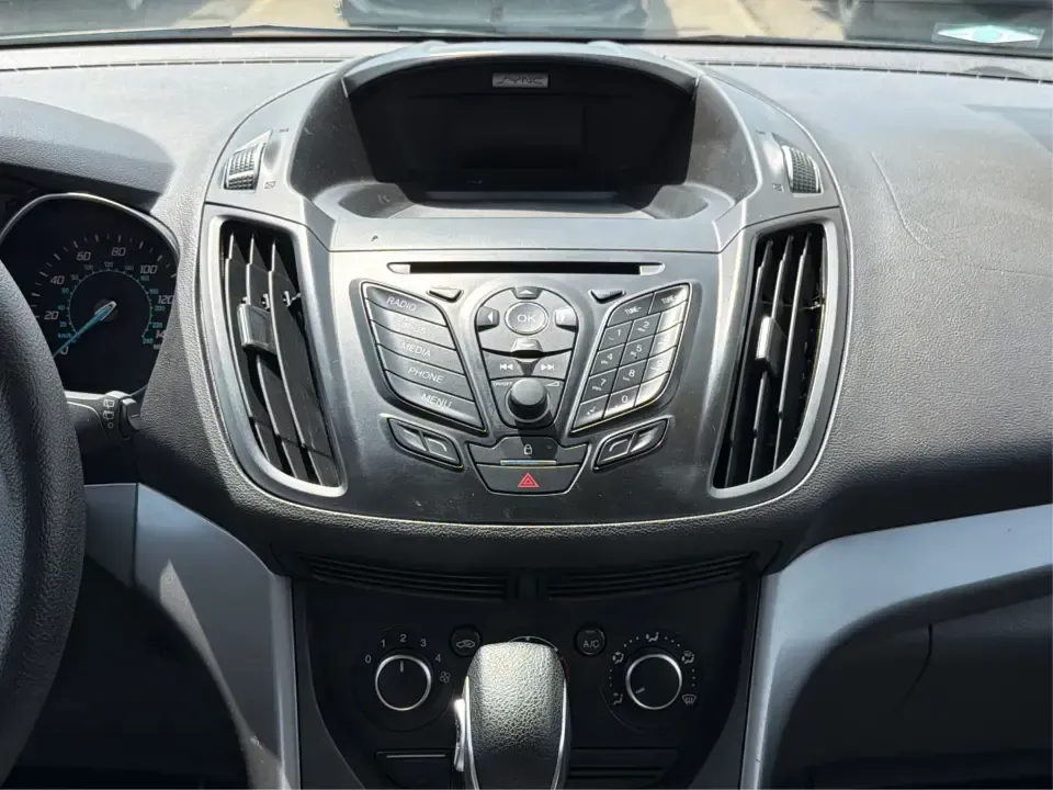 2015 Ford Escape SE (1FMCU9G98FU) with an 2.0L L4 DOHC 16V engine, 6-Speed Automatic transmission, located at 1099 N County Rd 25A, Troy, OH, 45373, (937) 908-9800, 40.057079, -84.212883 - Weekday commutes down I75, school drop-offs around Troy City Schools, and spontaneous weekend trips to Charleston Falls Preserve all get easier when you have an SUV that's the right size, the right power, and the right fit for your budget. This 2015 Ford Escape SE in Ingot Silver is built for real-l - Photo#13