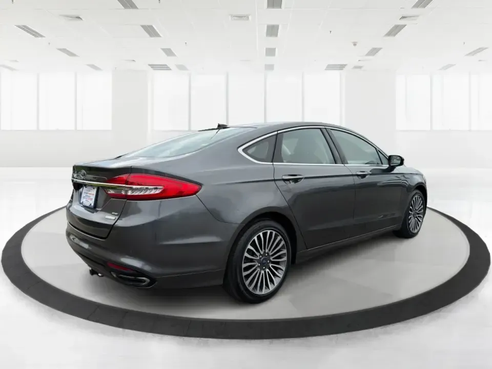 2017 Ford Fusion SE (3FA6P0H98HR) with an 2.0L L4 DOHC 16V engine, 6A transmission, located at 4508 South Dixie Dr, Moraine, OH, 45439, (937) 908-9800, 39.689976, -84.218452 - Picture your next week: a smooth, quiet commute down South Dixie Drive, quick errands to the Dayton Mall area, and a comfortable weekend drive toward Carillon Historical Park or a Reds day trip-without feeling like you're overpaying for a sedan that can't keep up. This 2017 Ford Fusion SE in sleek M - Photo#2