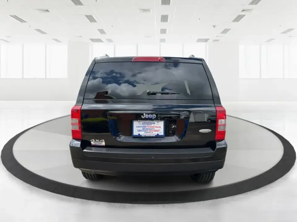 2014 Jeep Patriot Latitude (1C4NJRFB4ED) with an 2.4L I-4 DOHC engine, located at 8750 N County Rd 25A, Piqua, OH, 45356, (937) 908-9800, 40.164391, -84.232513 - Weekend adventures, winter commutes, and everyday errands feel a lot easier when you're in an SUV that's confident on Ohio backroads and comfortable in town. This **2014 Jeep Patriot Latitude 4WD** is a practical, go-anywhere choice for drivers who want Jeep capability without the full-size SUV foot - Photo#3