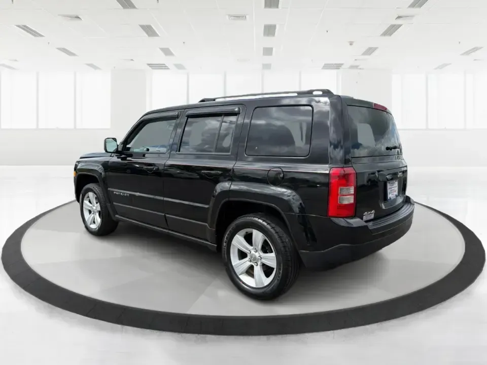 2014 Jeep Patriot Latitude (1C4NJRFB4ED) with an 2.4L I-4 DOHC engine, located at 8750 N County Rd 25A, Piqua, OH, 45356, (937) 908-9800, 40.164391, -84.232513 - Weekend adventures, winter commutes, and everyday errands feel a lot easier when you're in an SUV that's confident on Ohio backroads and comfortable in town. This **2014 Jeep Patriot Latitude 4WD** is a practical, go-anywhere choice for drivers who want Jeep capability without the full-size SUV foot - Photo#4