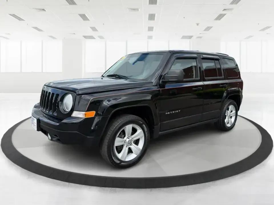 2014 Jeep Patriot Latitude (1C4NJRFB4ED) with an 2.4L I-4 DOHC engine, located at 8750 N County Rd 25A, Piqua, OH, 45356, (937) 908-9800, 40.164391, -84.232513 - Weekend adventures, winter commutes, and everyday errands feel a lot easier when you're in an SUV that's confident on Ohio backroads and comfortable in town. This **2014 Jeep Patriot Latitude 4WD** is a practical, go-anywhere choice for drivers who want Jeep capability without the full-size SUV foot - Photo#8