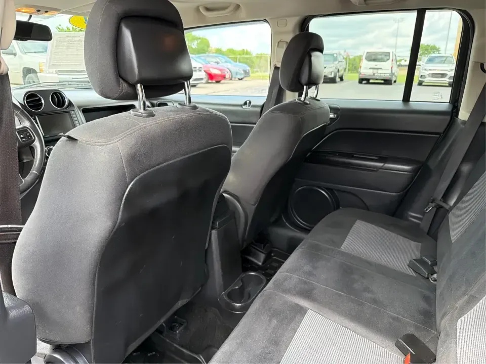 2014 Jeep Patriot Latitude (1C4NJRFB4ED) with an 2.4L I-4 DOHC engine, located at 8750 N County Rd 25A, Piqua, OH, 45356, (937) 908-9800, 40.164391, -84.232513 - Weekend adventures, winter commutes, and everyday errands feel a lot easier when you're in an SUV that's confident on Ohio backroads and comfortable in town. This **2014 Jeep Patriot Latitude 4WD** is a practical, go-anywhere choice for drivers who want Jeep capability without the full-size SUV foot - Photo#10