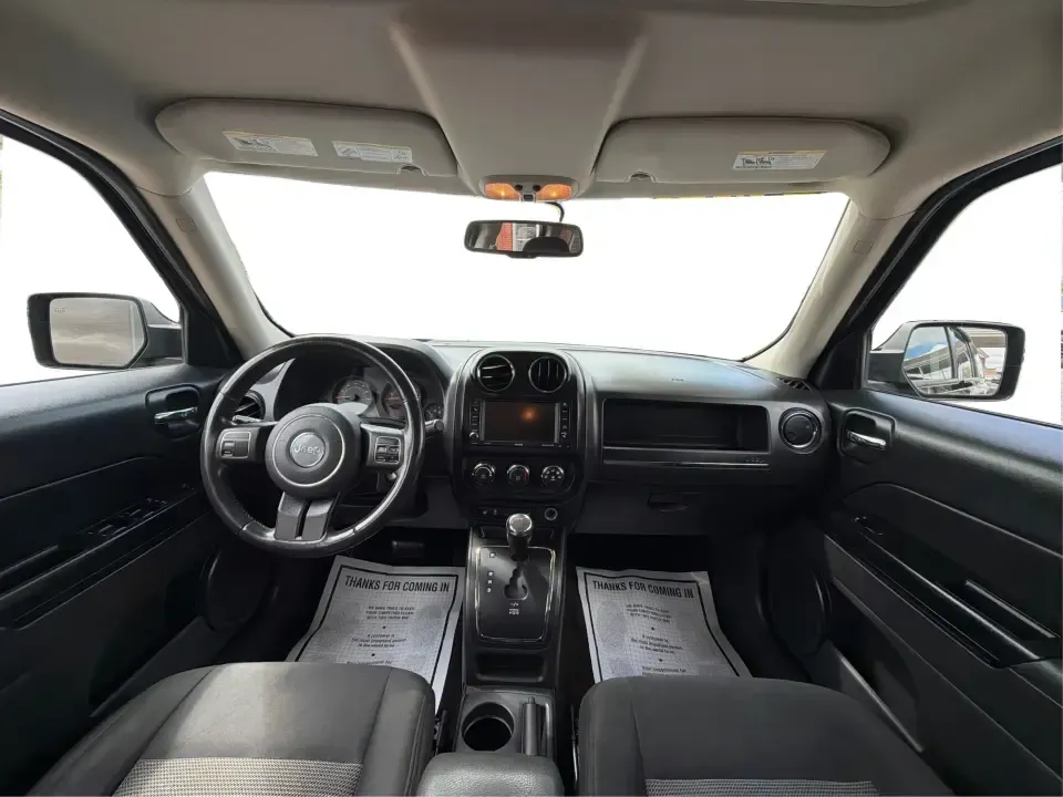 2014 Jeep Patriot Latitude (1C4NJRFB4ED) with an 2.4L I-4 DOHC engine, located at 8750 N County Rd 25A, Piqua, OH, 45356, (937) 908-9800, 40.164391, -84.232513 - Weekend adventures, winter commutes, and everyday errands feel a lot easier when you're in an SUV that's confident on Ohio backroads and comfortable in town. This **2014 Jeep Patriot Latitude 4WD** is a practical, go-anywhere choice for drivers who want Jeep capability without the full-size SUV foot - Photo#20