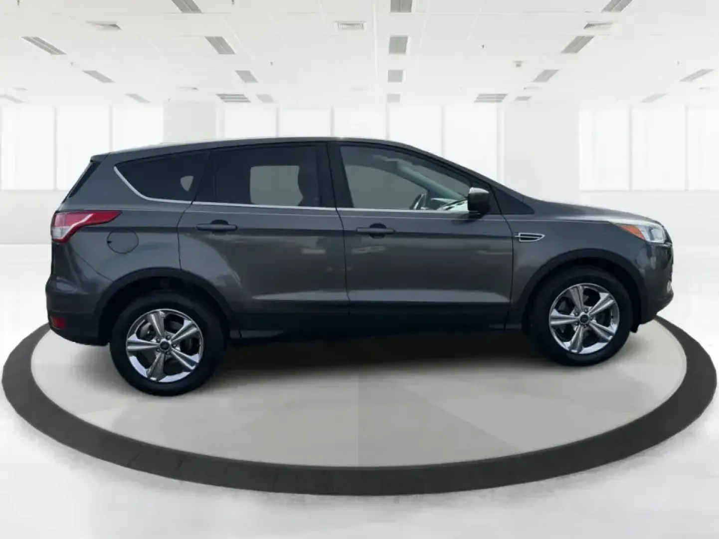 2016 Ford Escape SE (1FMCU0G75GU) with an 2.5L L4 DOHC 16V engine, 6-Speed Automatic transmission, located at 1099 N County Rd 25A, Troy, OH, 45373, (937) 908-9800, 40.057079, -84.212883 - Whether you're juggling school drop-offs, commuting up I75, or planning a weekend run to the Miami County Fairgrounds, this 2016 Ford Escape SE is the kind of practical SUV that fits real-life Troy, Ohio routines. With a versatile cabin, confident road manners, and easy-to-live-with features, it's a - Photo#1
