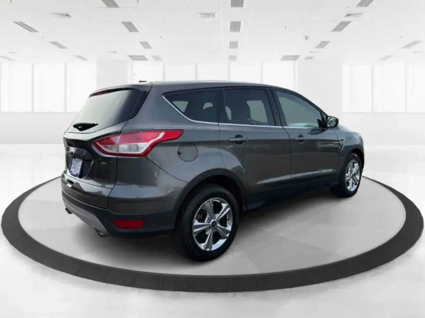 2016 Ford Escape SE (1FMCU0G75GU) with an 2.5L L4 DOHC 16V engine, 6-Speed Automatic transmission, located at 1099 N County Rd 25A, Troy, OH, 45373, (937) 908-9800, 40.057079, -84.212883 - Whether you're juggling school drop-offs, commuting up I75, or planning a weekend run to the Miami County Fairgrounds, this 2016 Ford Escape SE is the kind of practical SUV that fits real-life Troy, Ohio routines. With a versatile cabin, confident road manners, and easy-to-live-with features, it's a - Photo#2