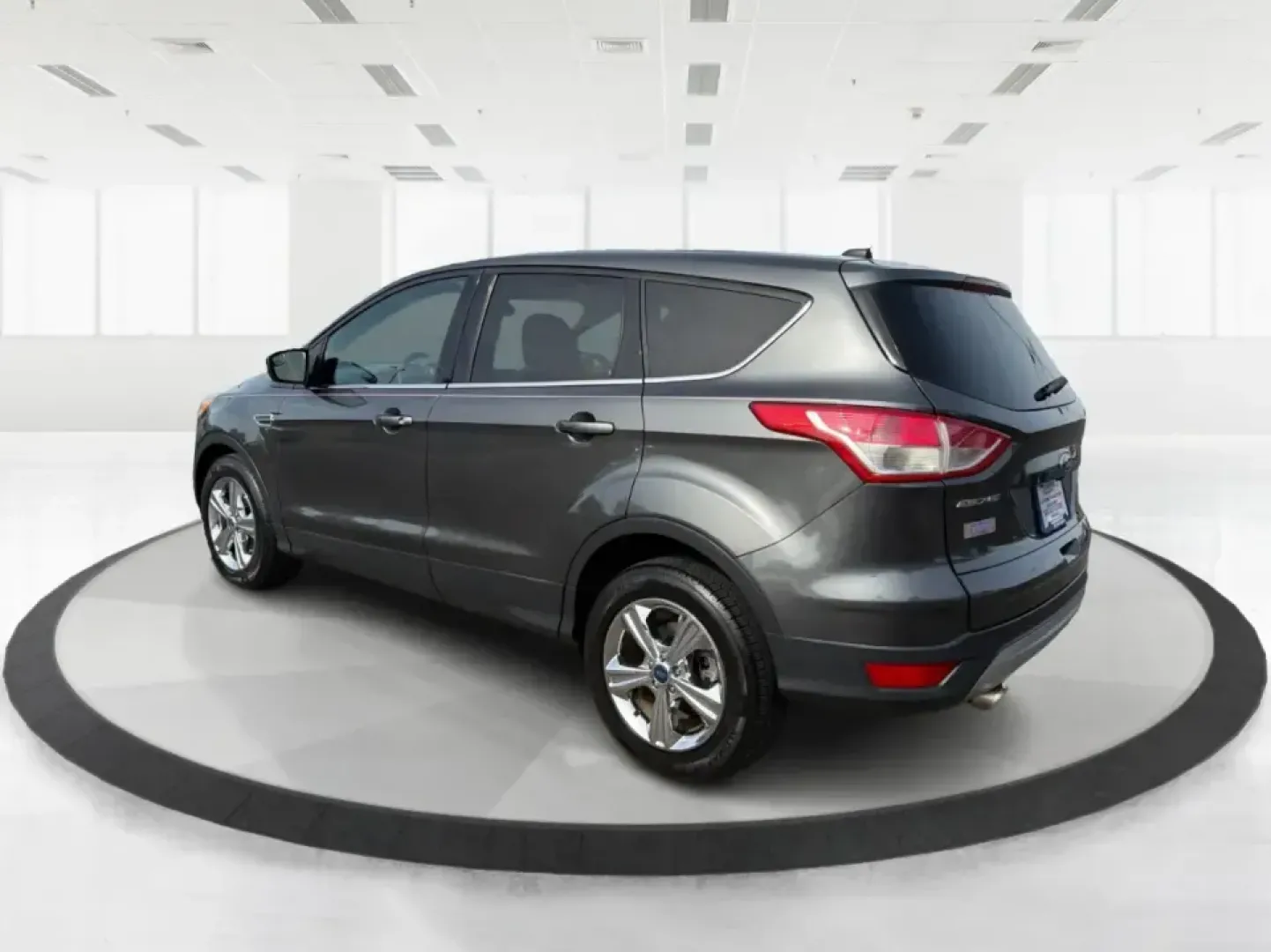 2016 Ford Escape SE (1FMCU0G75GU) with an 2.5L L4 DOHC 16V engine, 6-Speed Automatic transmission, located at 1099 N County Rd 25A, Troy, OH, 45373, (937) 908-9800, 40.057079, -84.212883 - Whether you're juggling school drop-offs, commuting up I75, or planning a weekend run to the Miami County Fairgrounds, this 2016 Ford Escape SE is the kind of practical SUV that fits real-life Troy, Ohio routines. With a versatile cabin, confident road manners, and easy-to-live-with features, it's a - Photo#4