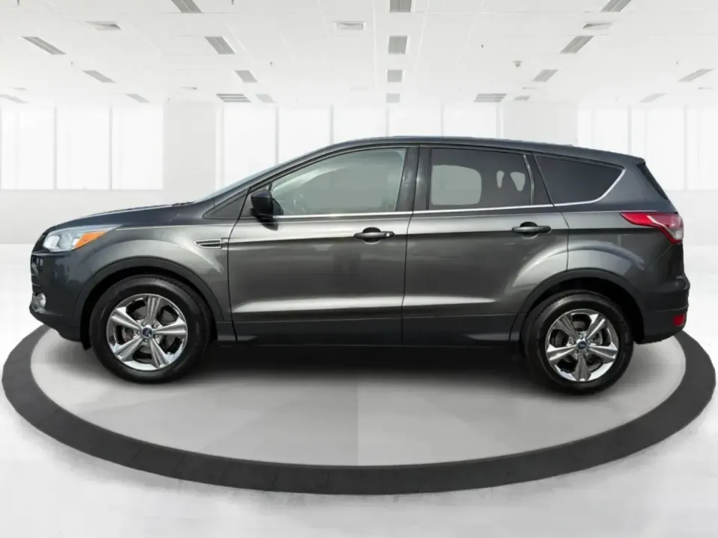 2016 Ford Escape SE (1FMCU0G75GU) with an 2.5L L4 DOHC 16V engine, 6-Speed Automatic transmission, located at 1099 N County Rd 25A, Troy, OH, 45373, (937) 908-9800, 40.057079, -84.212883 - Whether you're juggling school drop-offs, commuting up I75, or planning a weekend run to the Miami County Fairgrounds, this 2016 Ford Escape SE is the kind of practical SUV that fits real-life Troy, Ohio routines. With a versatile cabin, confident road manners, and easy-to-live-with features, it's a - Photo#5