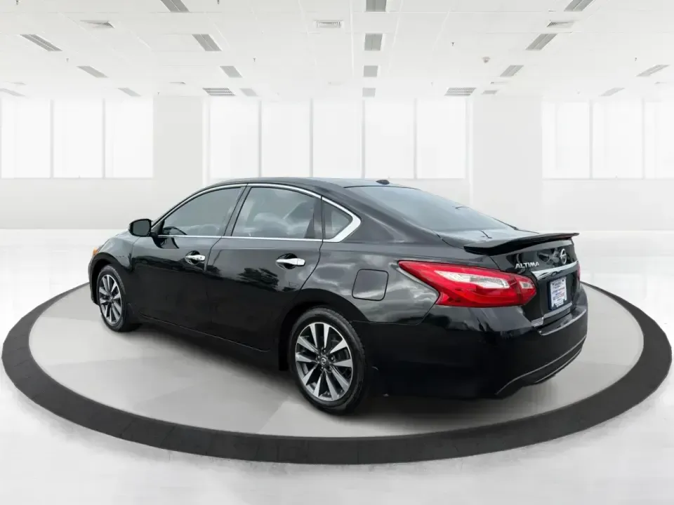 2016 Nissan Altima 2.5 SL (1N4AL3AP1GC) with an 2.5L I-4 DOHC engine, CVT transmission, located at 880 E. National Road, Vandalia, OH, 45377, (937) 908-9800, 39.891918, -84.183594 - Whether you're a Dayton-area commuter stacking highway miles, a busy parent shuttling kids between school and practice, or a weekend road-trip planner who wants comfort without overspending, this **2016 Nissan Altima 2.5 SL** is built for real life. With a sleek **Super Black** exterior and an upsca - Photo#4