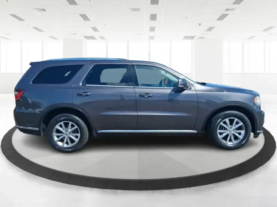 2015 Dodge Durango Limited (1C4RDJDG7FC) with an 3.6L V6 DOHC 24V engine, 8-Speed Automatic transmission, located at 8750 N County Rd 25A, Piqua, OH, 45356, (937) 908-9800, 40.164391, -84.232513 - Pack up the kids, load the cargo, and point the nose toward your next weekend getaway-this 2015 Dodge Durango Limited is built for real life in West Central Ohio. Whether you're shuttling a growing family to practice, commuting up I75, or planning a road trip to Indian Lake, the Durango delivers the - Photo#1