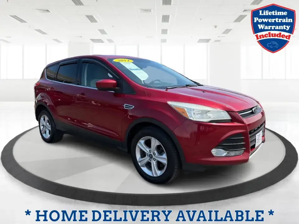 2014 Ford Escape SE (1FMCU9G9XEU) with an 2.0L L4 DOHC 16V engine, 6-Speed Automatic transmission, located at 4508 South Dixie Dr, Moraine, OH, 45439, (937) 908-9800, 39.689976, -84.218452 - Picture your next Ohio weekend: the kids loaded up for a day at Carillon Historical Park, a cooler in back for a picnic at Cox Arboretum, or a quick escape down I75 for a last-minute road trip-without worrying about whether your SUV can handle rain, slush, or a fully packed cargo area. This 2014 For - Photo#0