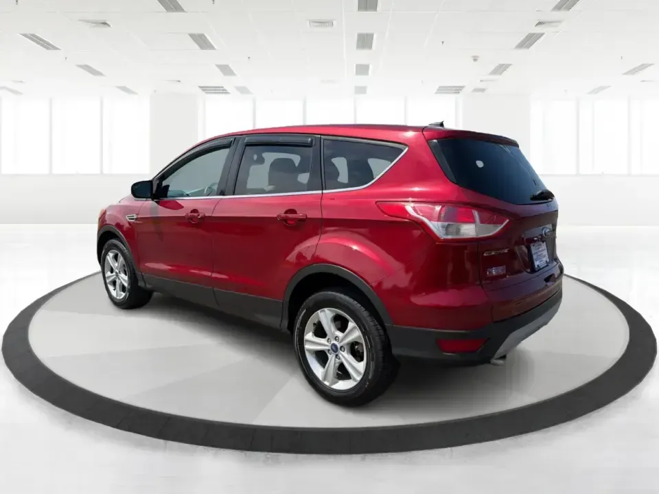 2014 Ford Escape SE (1FMCU9G9XEU) with an 2.0L L4 DOHC 16V engine, 6-Speed Automatic transmission, located at 4508 South Dixie Dr, Moraine, OH, 45439, (937) 908-9800, 39.689976, -84.218452 - Picture your next Ohio weekend: the kids loaded up for a day at Carillon Historical Park, a cooler in back for a picnic at Cox Arboretum, or a quick escape down I75 for a last-minute road trip-without worrying about whether your SUV can handle rain, slush, or a fully packed cargo area. This 2014 For - Photo#4