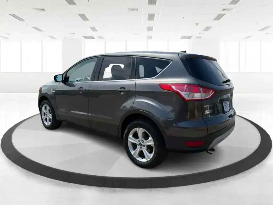 2016 Ford Escape SE (1FMCU0G77GU) with an 2.5L L4 DOHC 16V engine, 6-Speed Automatic transmission, located at 4508 South Dixie Dr, Moraine, OH, 45439, (937) 908-9800, 39.689976, -84.218452 - Whether you're commuting up and down South Dixie Drive, running errands between Moraine and Dayton, or packing up for a weekend getaway, this 2016 Ford Escape SE is the kind of practical SUV that fits real life. It's easy to park, comfortable for daily driving, and versatile enough for everything fr - Photo#4